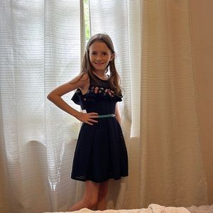 Beautiful navy blue dress with flowers. In great condition!